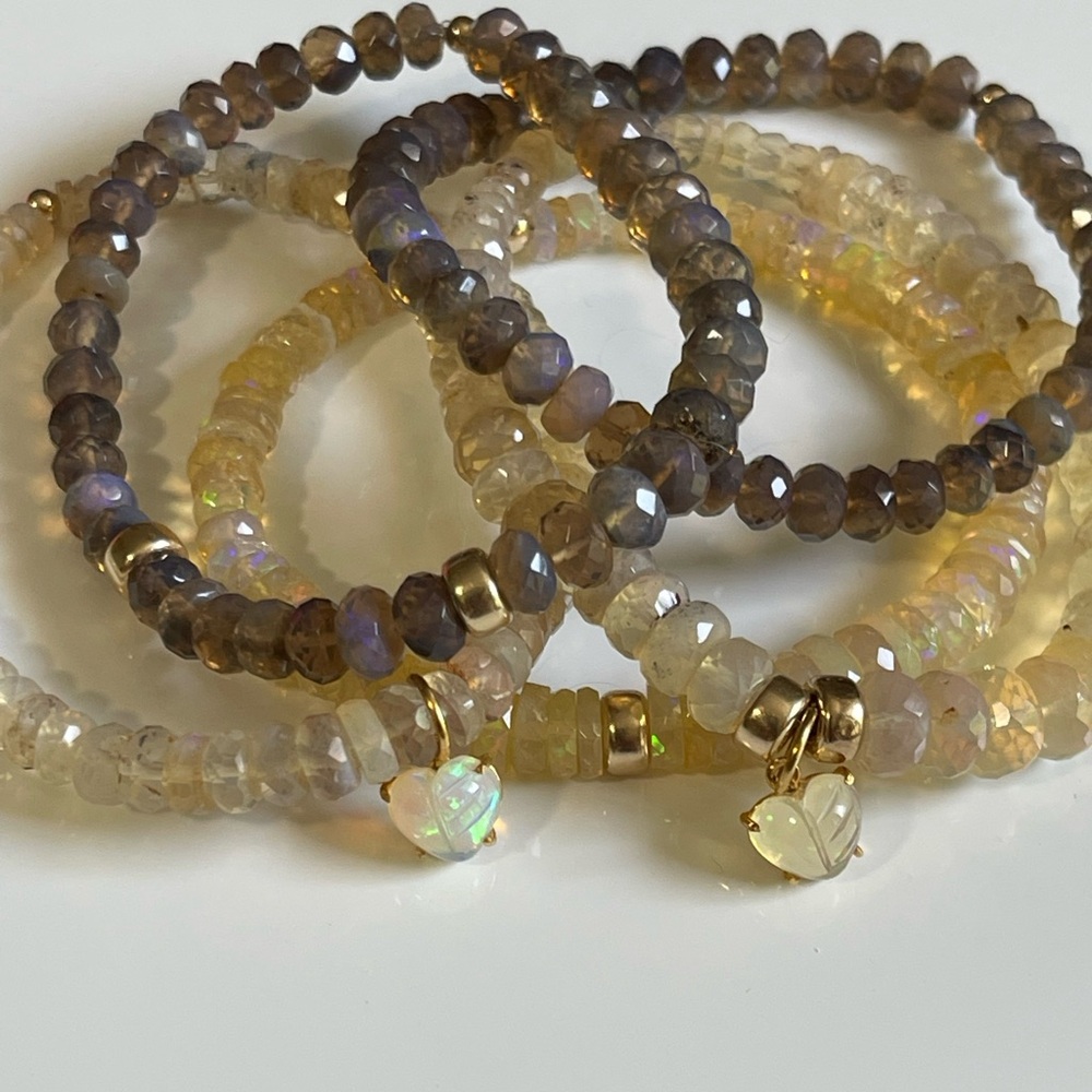 Australian Opal stretchy bracelet with gold charms or solid gold rondel.